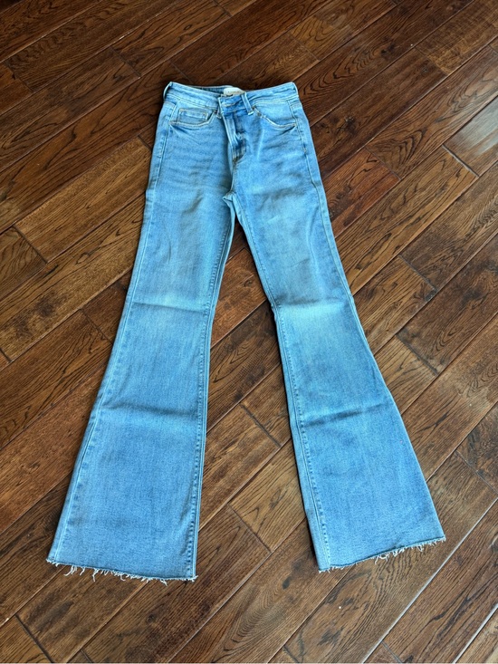 Risen Jeans Denim - Light Blue High-Rise Flare Jeans with Raw Hem